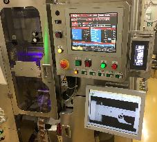 Filling machine with Yushin's FSS installed