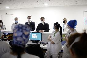 French President Emmanuel Macron visits Poissy/Saint Germain en Laye hospital