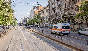 Empty streets and closed shops in Milan