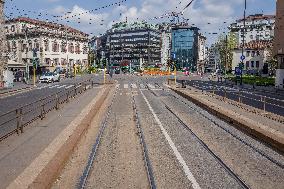 Empty streets and closed shops in Milan