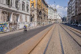 Empty streets and closed shops in Milan