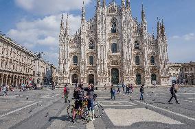 Empty streets and closed shops in Milan