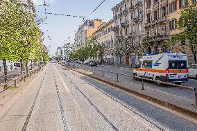 Empty streets and closed shops in Milan