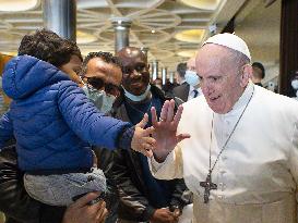 Pope spends name-day with poor receiving Covid-19 vaccine