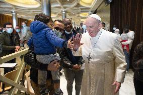 Pope spends name-day with poor receiving Covid-19 vaccine