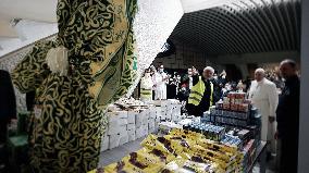 Pope spends name-day with poor receiving Covid-19 vaccine