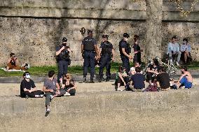 People Enjoying the Warm Weather Paris