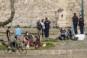 People Enjoying the Warm Weather Paris