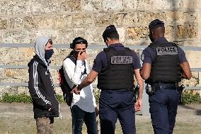 People Enjoying the Warm Weather Paris