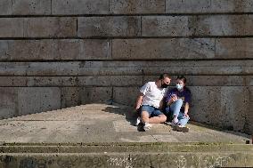 People Enjoying the Warm Weather Paris
