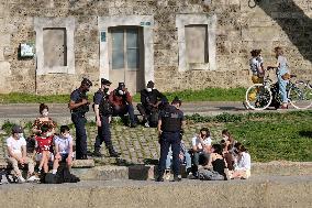 People Enjoying the Warm Weather Paris