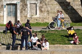 People Enjoying the Warm Weather Paris