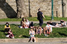 People Enjoying the Warm Weather Paris