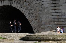 People Enjoying the Warm Weather Paris