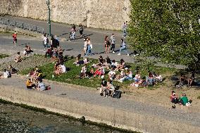 People Enjoying the Warm Weather Paris