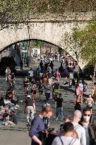 People Enjoying the Warm Weather Paris