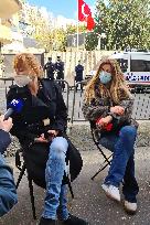 Women sit in outside Turkish Embassy to protest after Sofagate - Paris