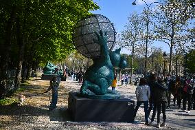 20 cat sculptures by Geluck displayed on Champs-Elysees