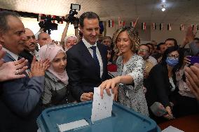 Bashar and Asma Al Assad Vote for Presidential Election - Douma