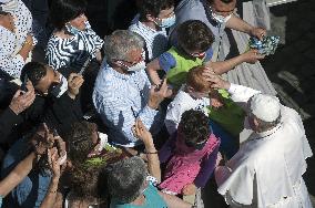 Pope Francis arrives for his weekly general audience