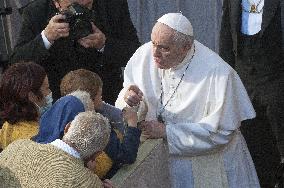 Pope Francis arrives for his weekly general audience