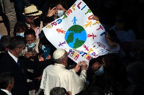 Pope Francis arrives for his weekly general audience