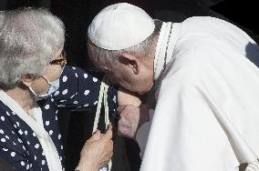 Pope Francis arrives for his weekly general audience