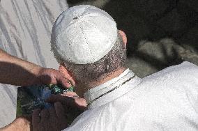 Pope Francis arrives for his weekly general audience