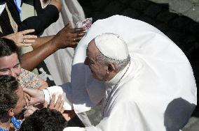 Pope Francis arrives for his weekly general audience