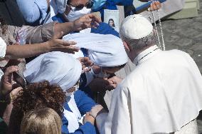 Pope Francis arrives for his weekly general audience