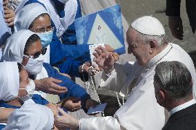 Pope Francis arrives for his weekly general audience