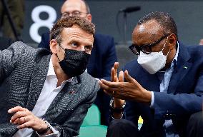 President Emmanuel Macron watchs a match of the Basketball - Kigali