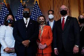 Nancy Pelosi swears-in Troy Carter - Washington