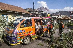 Daily-life Under The Shadows of Sinabung Eruption - Indonesia