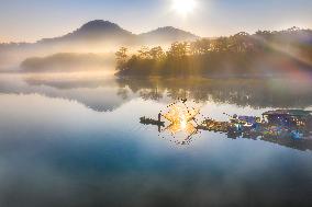 A Man Fishing In Tuyen Lam Lake - Vietnam