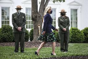 First lady Jill Biden participates in an Arbor Day tree planting ceremony