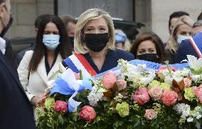 Marine Le Pen Lays Flowers To A Statue Of Joan of Arc - Paris