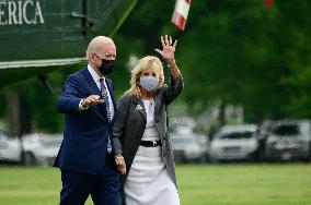 U.S. President Joe Biden and First Lady Jill Biden arrive to the White House Ellipse on Marine One after a visit to Virginia