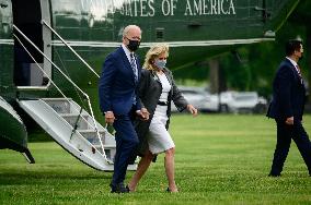 U.S. President Joe Biden and First Lady Jill Biden arrive to the White House Ellipse on Marine One after a visit to Virginia