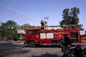 Workers Spray Disinfectant On The Road In Ajmer - India