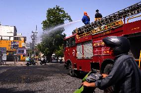 Workers Spray Disinfectant On The Road In Ajmer - India