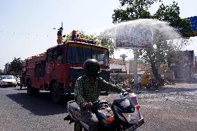 Workers Spray Disinfectant On The Road In Ajmer - India