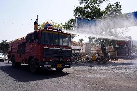 Workers Spray Disinfectant On The Road In Ajmer - India