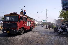 Workers Spray Disinfectant On The Road In Ajmer - India