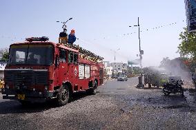 Workers Spray Disinfectant On The Road In Ajmer - India