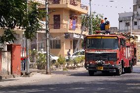 Workers Spray Disinfectant On The Road In Ajmer - India