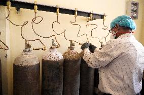 Workers Refills Cylinders With Medical Oxygen - Rajasthan