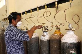 Workers Refills Cylinders With Medical Oxygen - Rajasthan