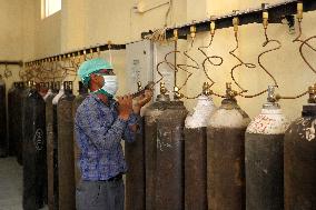 Workers Refills Cylinders With Medical Oxygen - Rajasthan