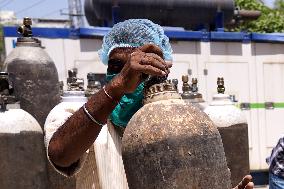 Workers Sort Oxygen Cylinders - Rajasthan
